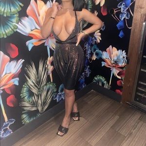 Black and gold one piece